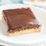 Piece of eclair cake on a plate .