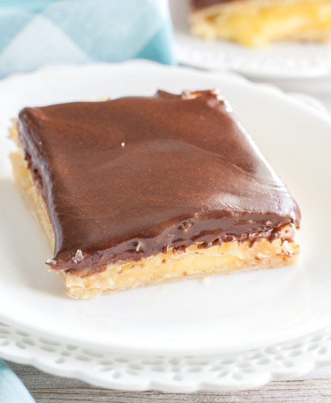 A piece of eclair cake on white plate