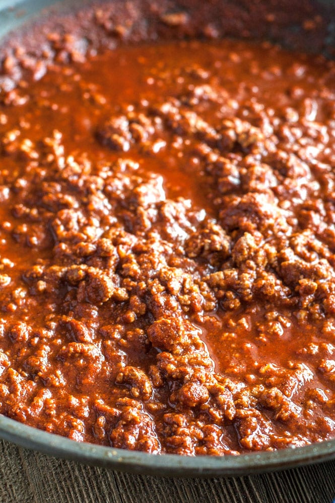 Ground beef and sloppy joe mix in a skillet 