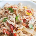 shredded chicken and peppers in a bowl