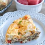 Piece of breakfast casserole on a plate.