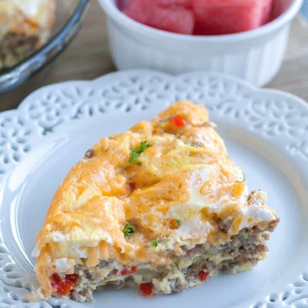 Piece of breakfast casserole on a plate.