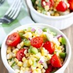 Two bowls of corn salad.