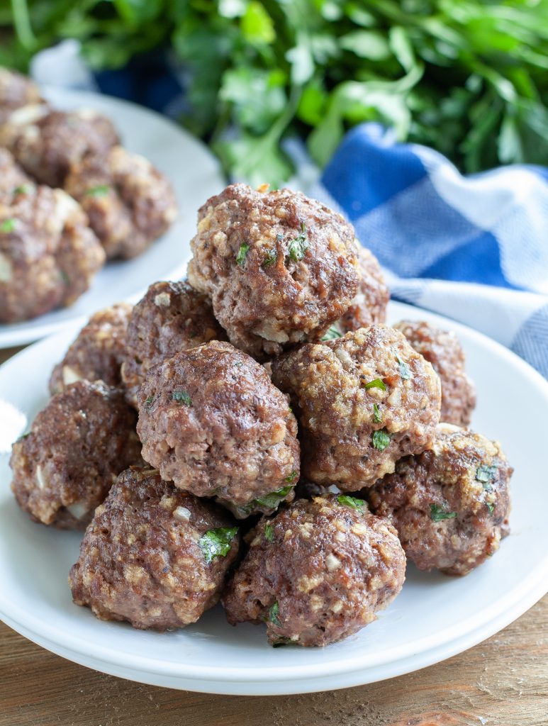 Stacked Meatballs on a white plate