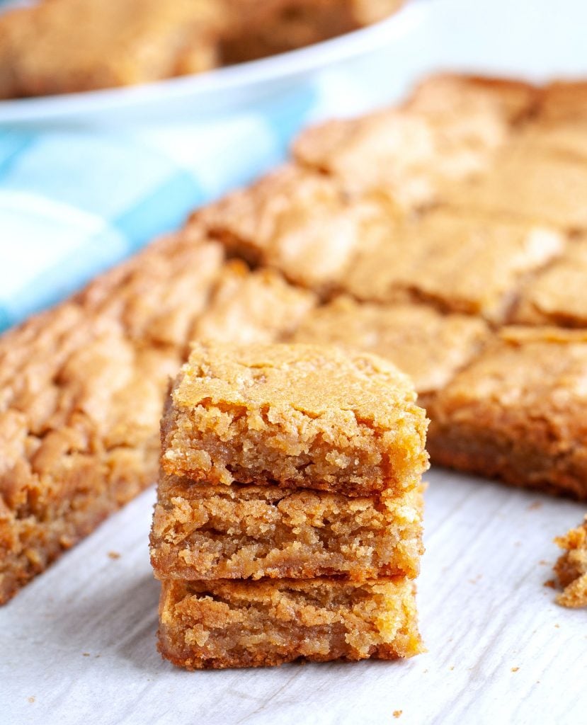 Three stacked butterscotch brownies. 