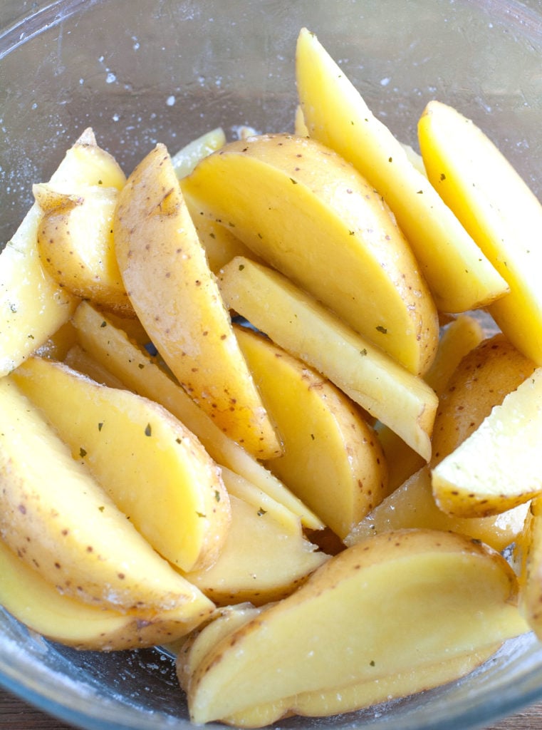 Potatoes in a bowl with ranch seasoning