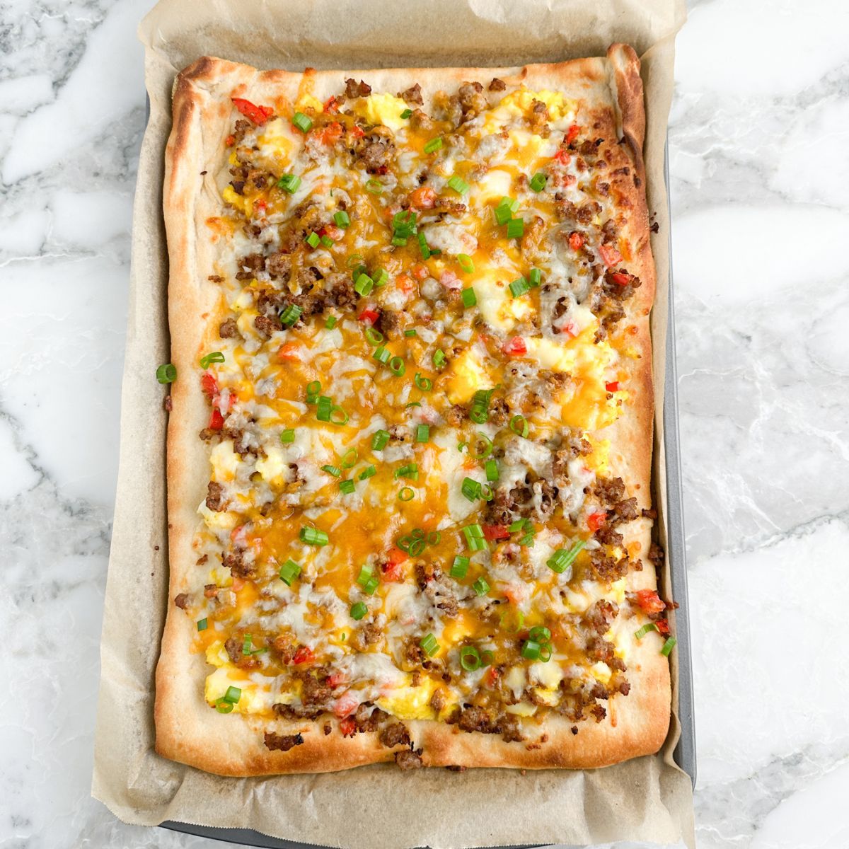 Breakfast pizza in a pan.
