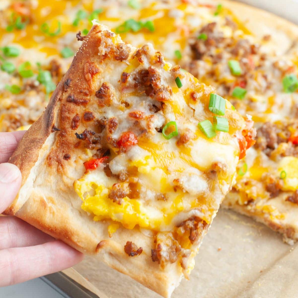 Piece of breakfast pizza.