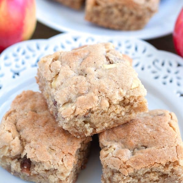 Blondies stacked on plate.