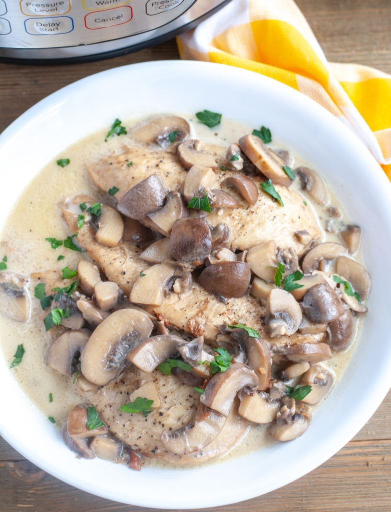 Instant Pot Chicken Marsala chicken marsala in a serving dish