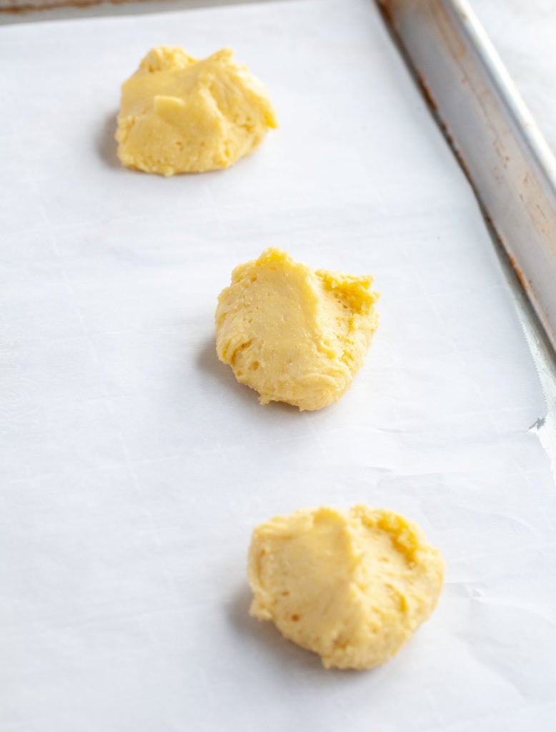 Lemon cookie dough on baking sheet