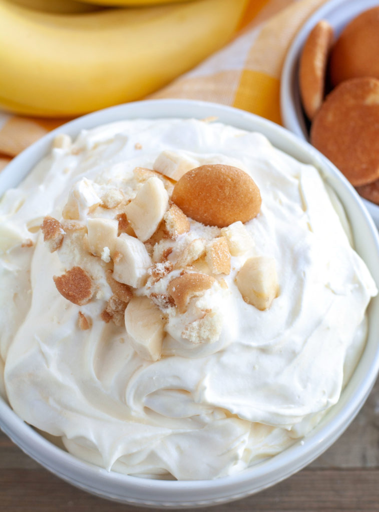 Banana Pudding Dip in a bowl with bananas and cookies