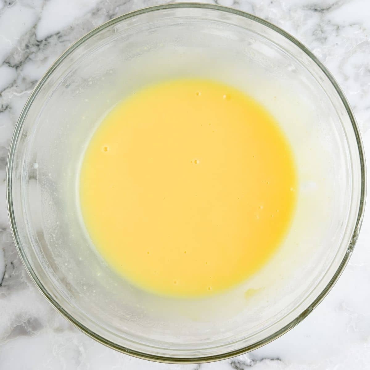 Bowl of vanilla pudding.
