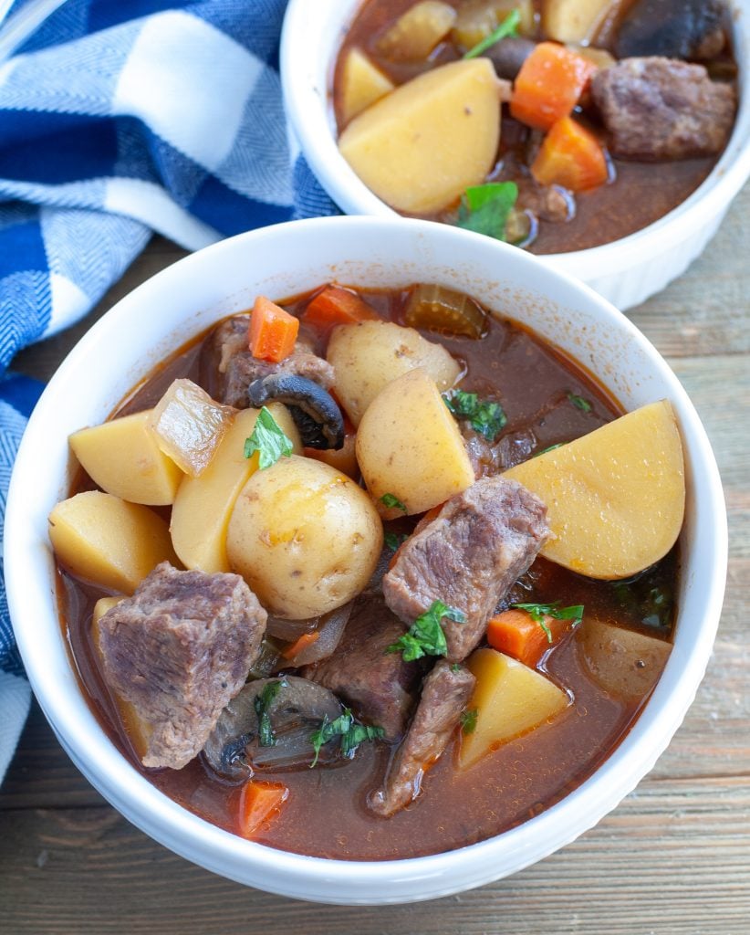 2 bowls of slow cooker beef stew and a napkin