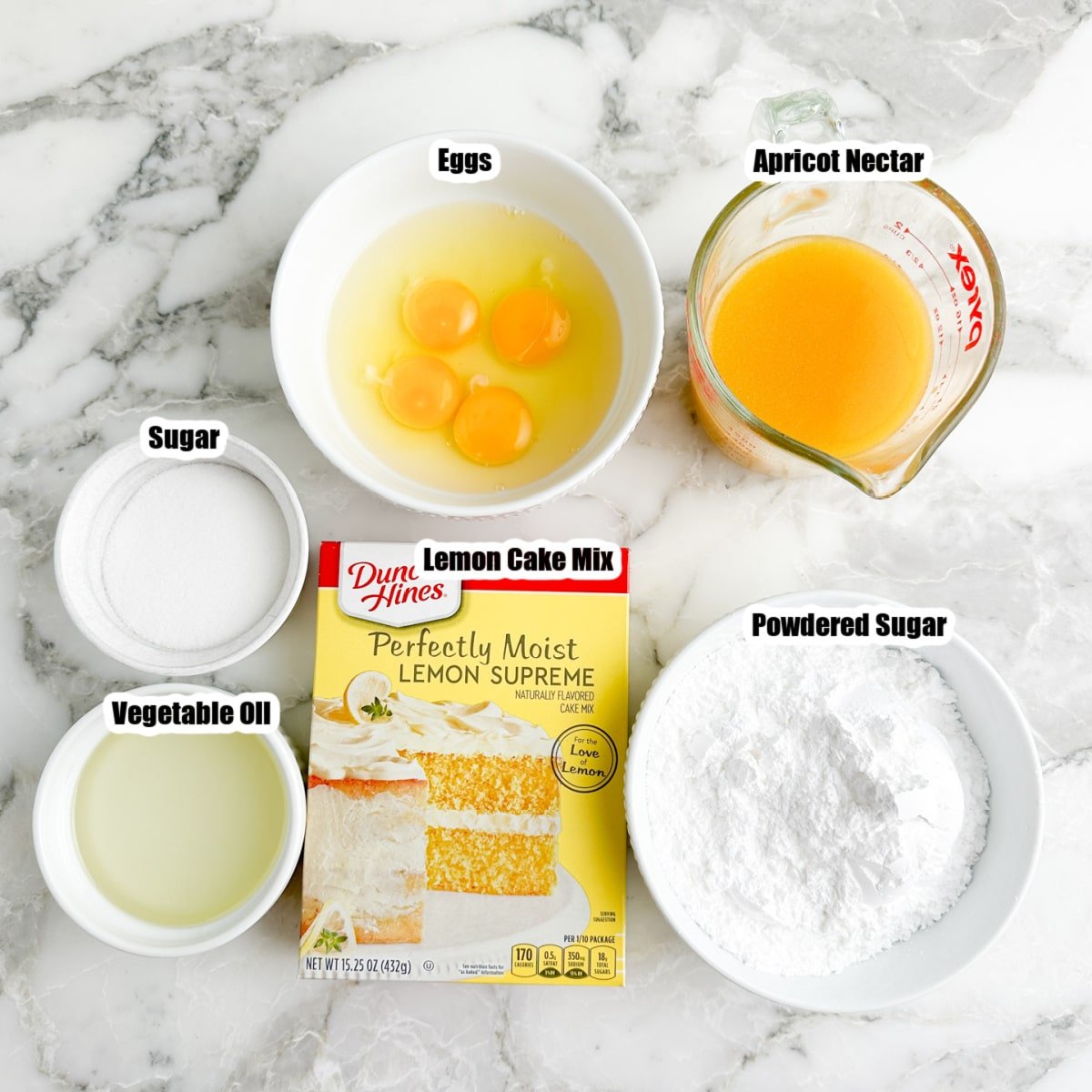 Box of lemon cake mix, bowl of eggs, apricot nectar juice, oil, powdered sugar, and sugar.