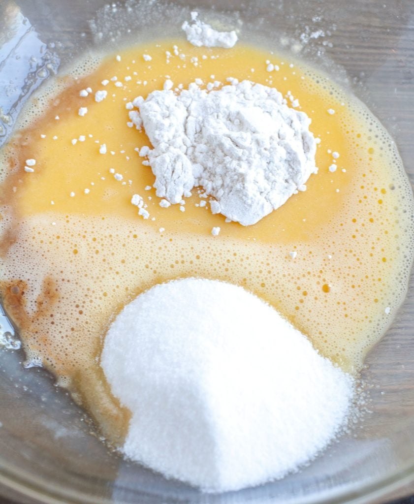 Beaten eggs, flour, sugar, vanilla, salt in a glass bowl