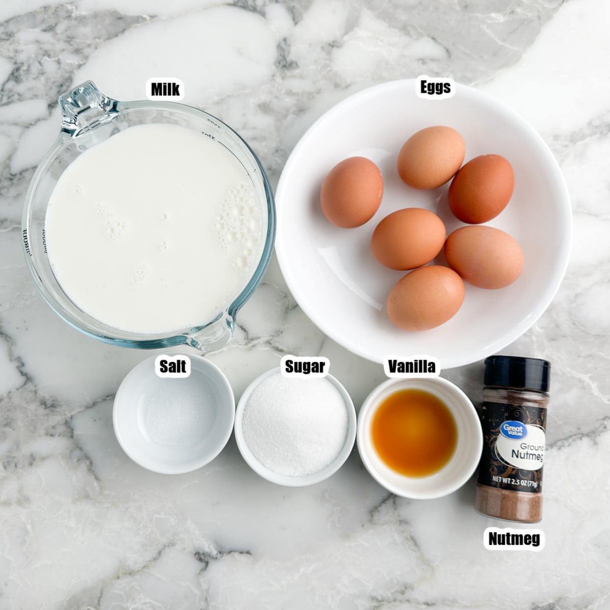 Eggs, milk, sugar, vanilla, salt, and nutmeg.