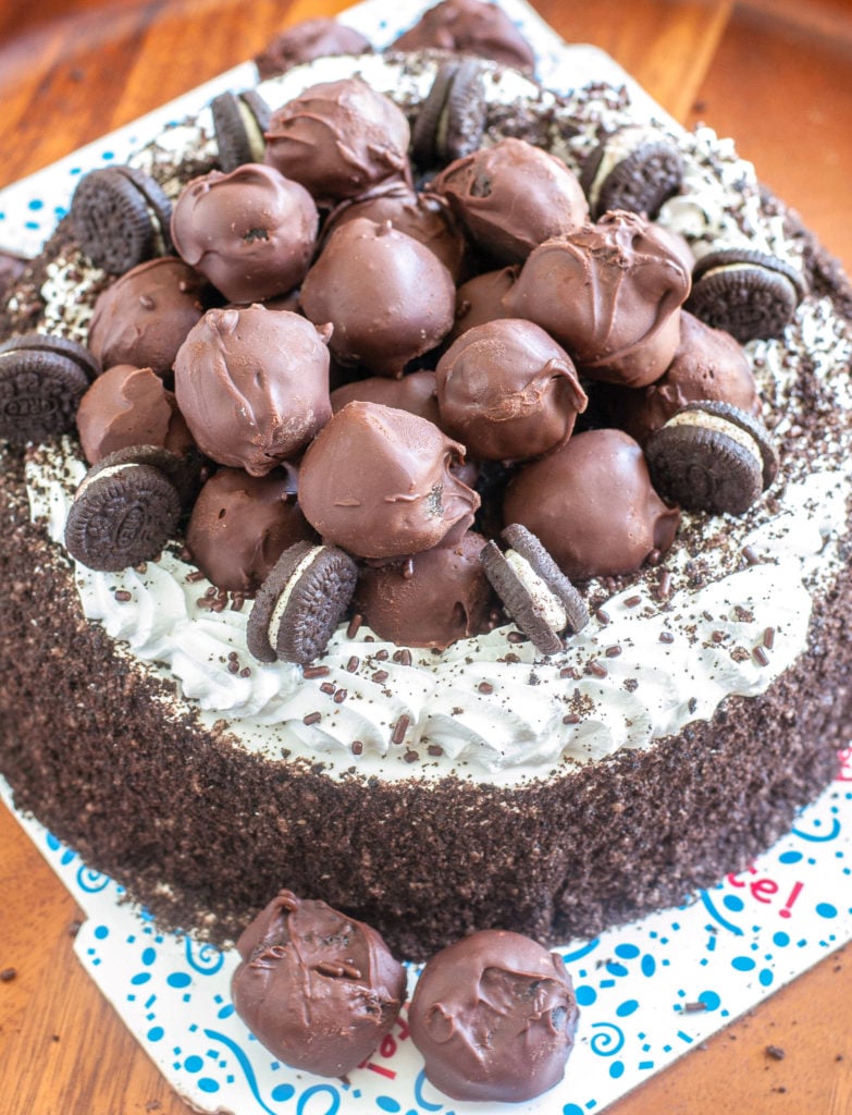 Ice Cream Cake topped with mini OREOS and OREO truffles