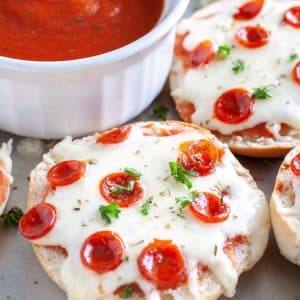 Bagel with cheese and pepperoni.