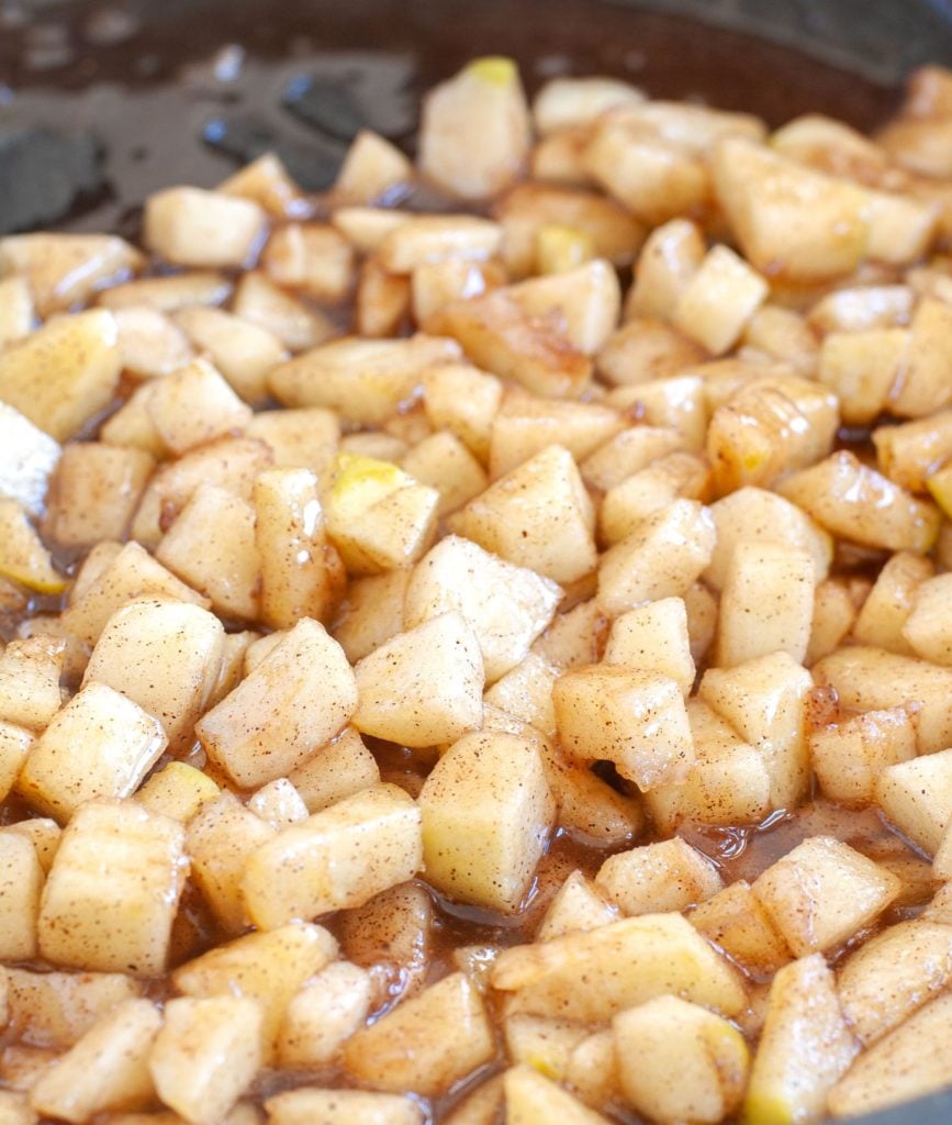 Apple pie filling in a saucepan. 