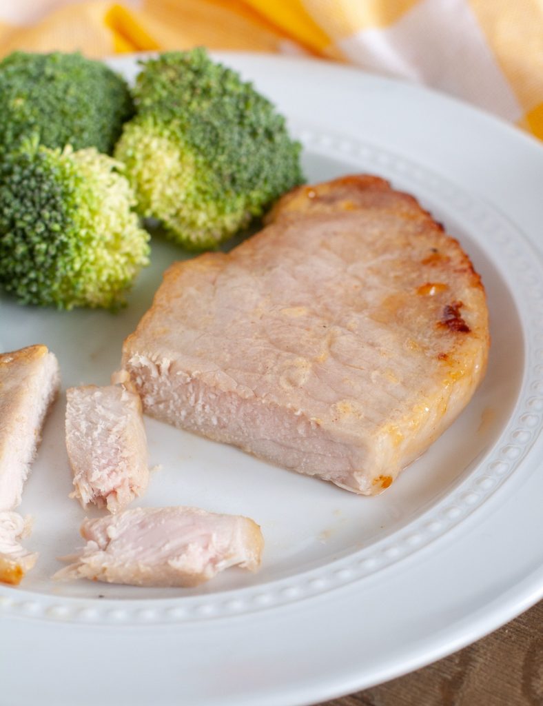 Pork Chop on a plate with broccoli
