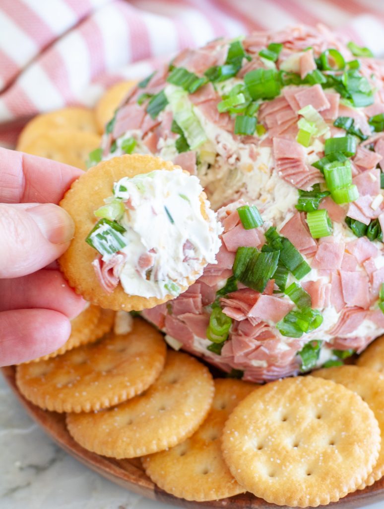 Cream cheese mixture spread on cracker