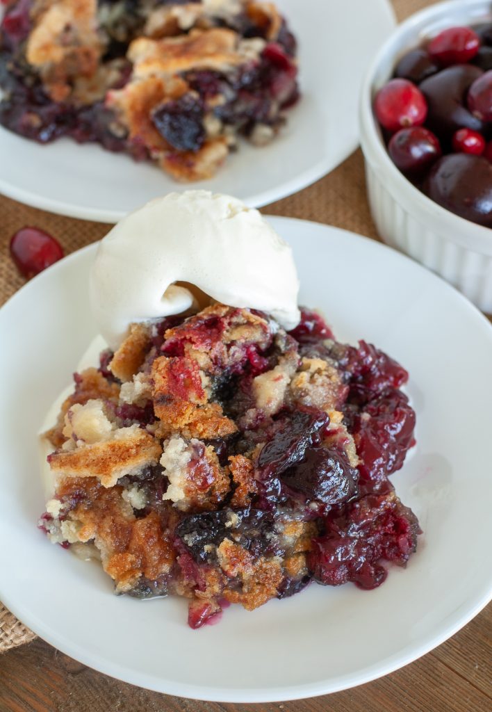 Plate with cranberry cherry dump cake