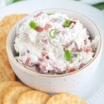 2 picture collage, one with glass bowl with ingredients and the other mixture of cream cheese and other ingredients