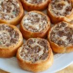 Sausage cream cheese rolls on plate.