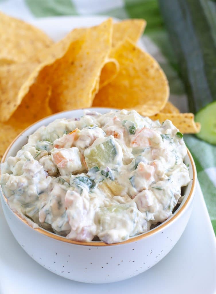 cucumber dip in bowl with chips