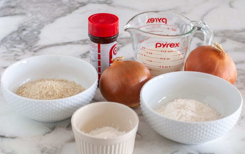 Bowl of flour, cornstarch, onion, milk, seasoning