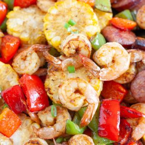 Shrimp and peppers in bowl.