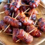 bacon wrapped smokies on a plate