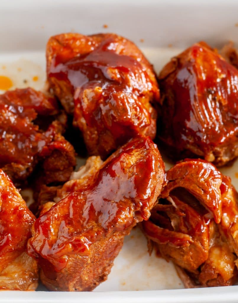 Ribs with bbq sauce in casserole dish