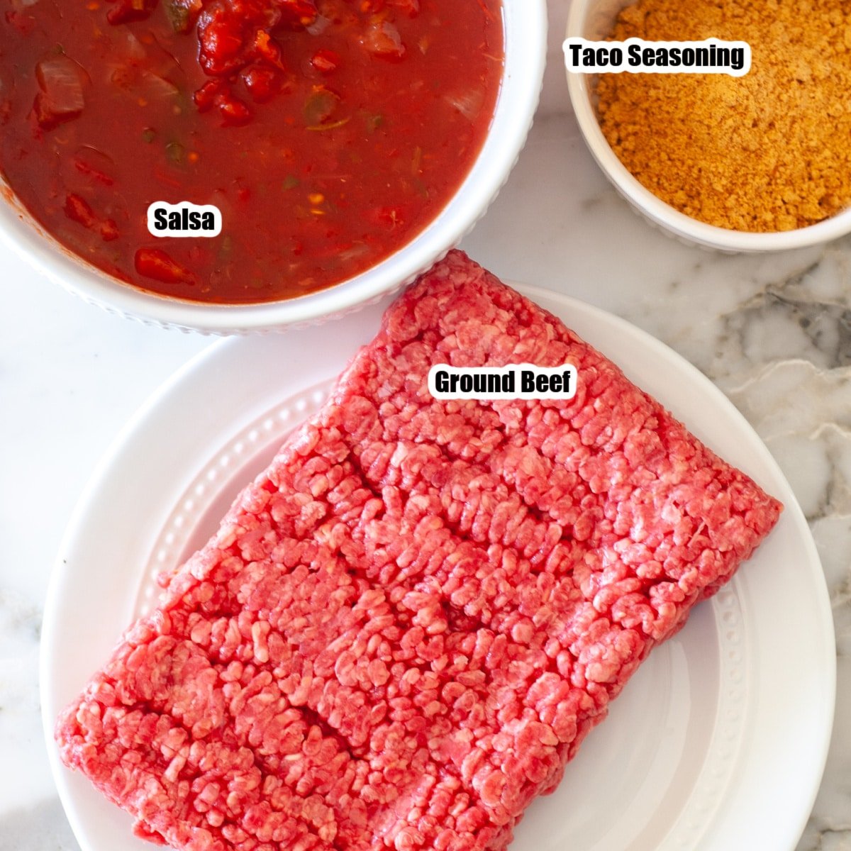 Ground beef, bowl of salsa, bowl of taco seasoning.