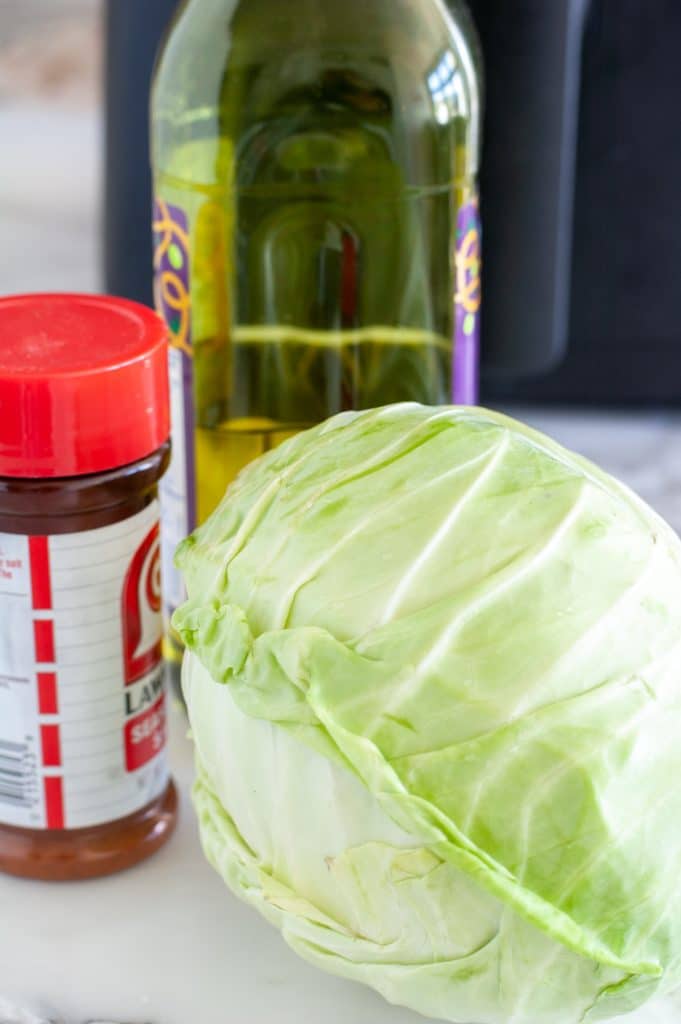 Head of cabbage, oil and seasoned salt