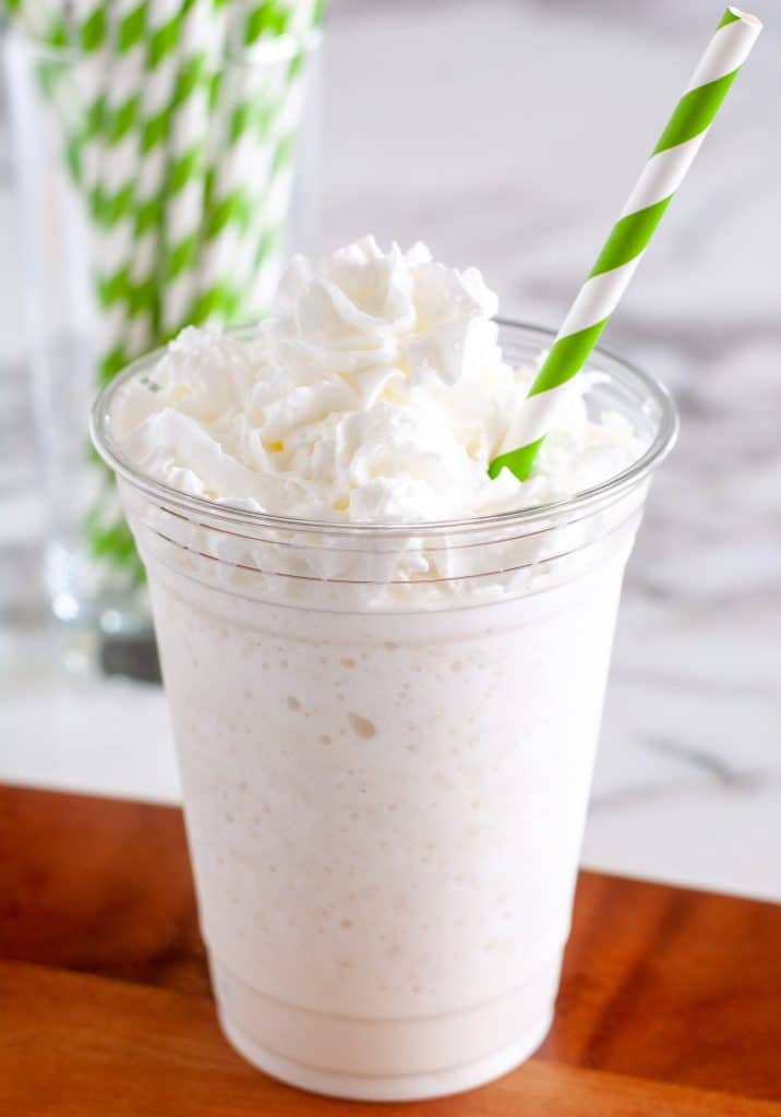 vanilla frappuccino in a glass with straw