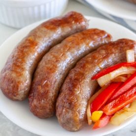 Plate of sausages and peppers.