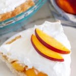Piece of peach pie on a plate
