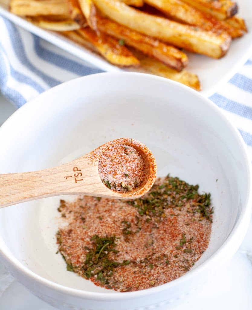 seasoning mix in a wooden spoon