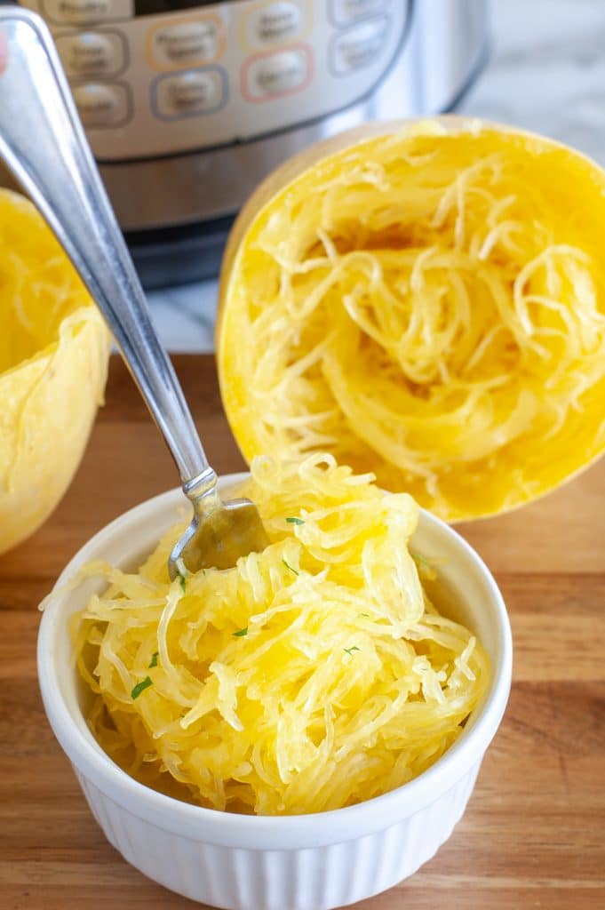 Fork in a bowl of cooked spaghetti squash