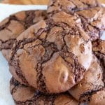 Chocolate cookie stacked on plate.