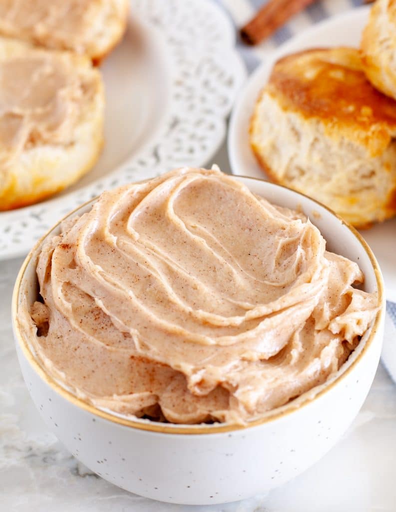 Cinnamon butter in a bowl with biscuits