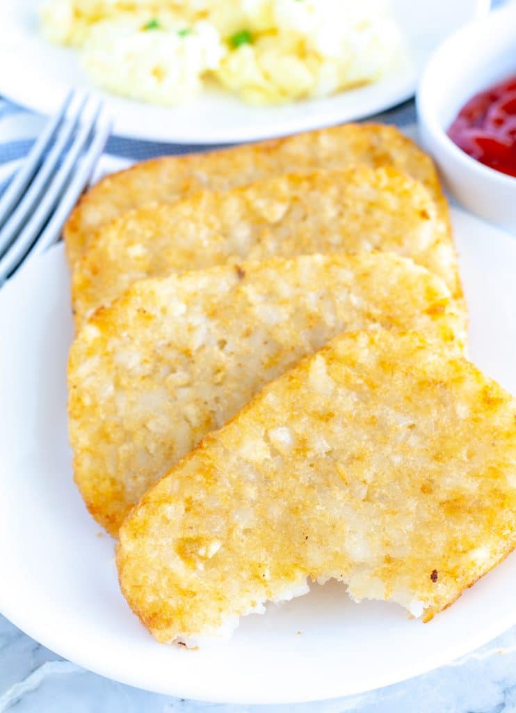 hash browns with a bite taken out