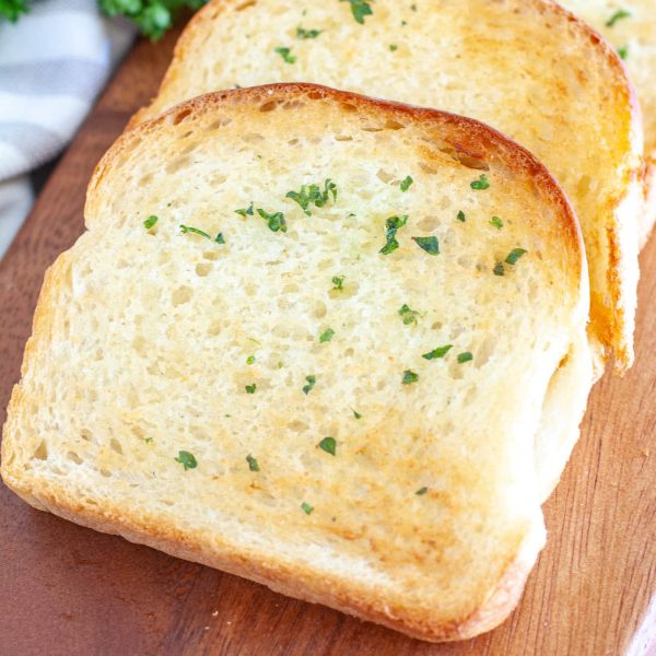 Slices of toast on plate.