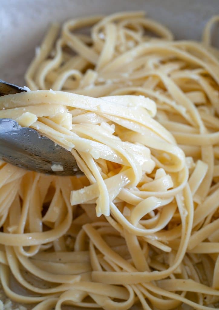 Pasta in tongs