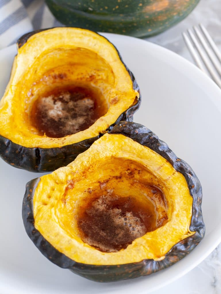 Cooked acorn squash on a plate