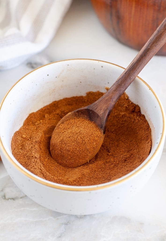 Spices in a bowl with a spoon