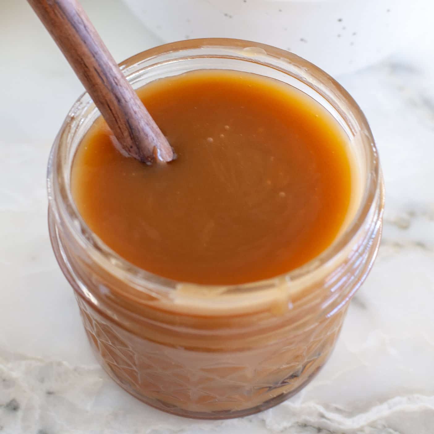 Jar of caramel sauce.