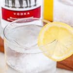 Vodka soda in a glass with lemon